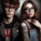 young couple male and female wearin the latest designer glasses at ilkeston factory specs