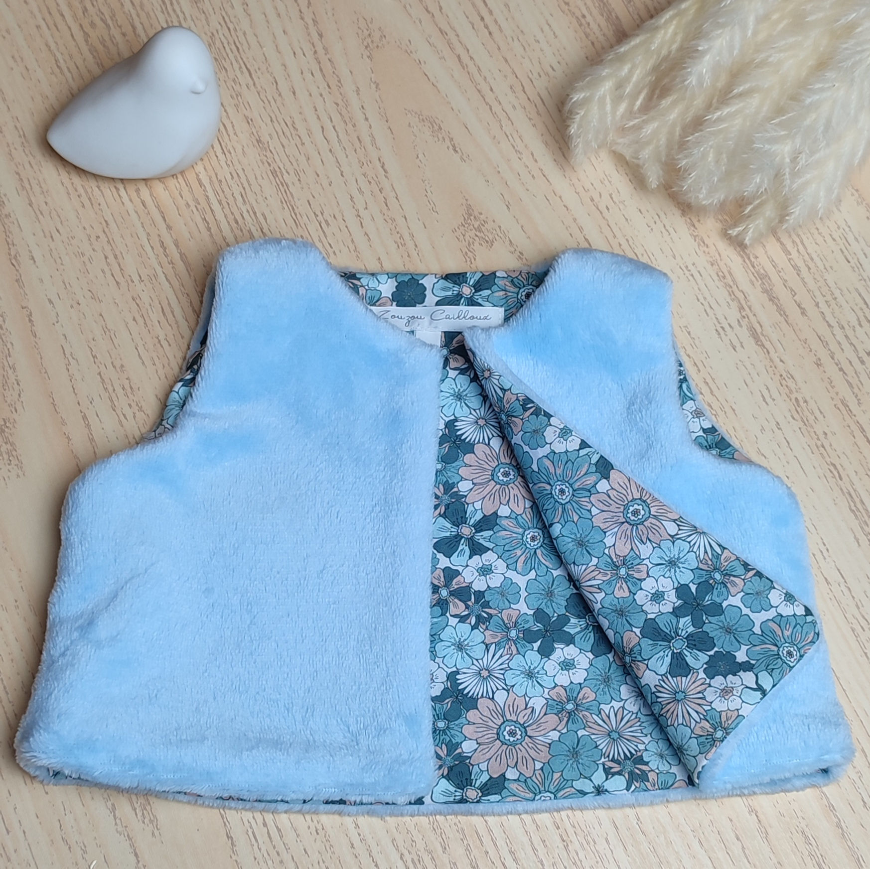 Gilet de berger bleu fleurs bébé Zouzou Cailloux made in France