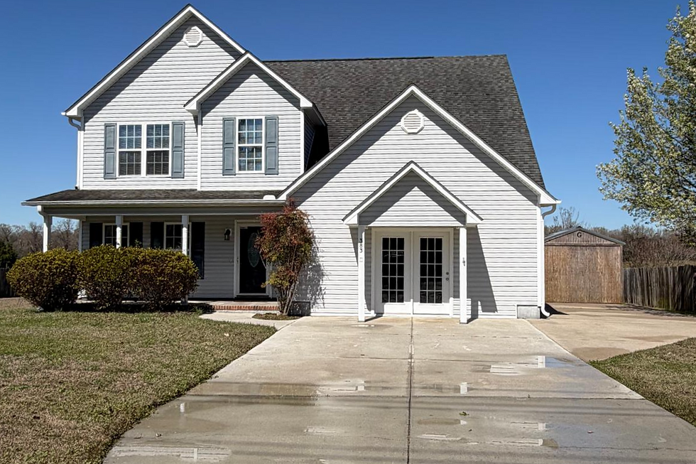 A house in Wilmington, NC after both techniques: soft wash and pressure wash being applied by Pro Washing Plus.