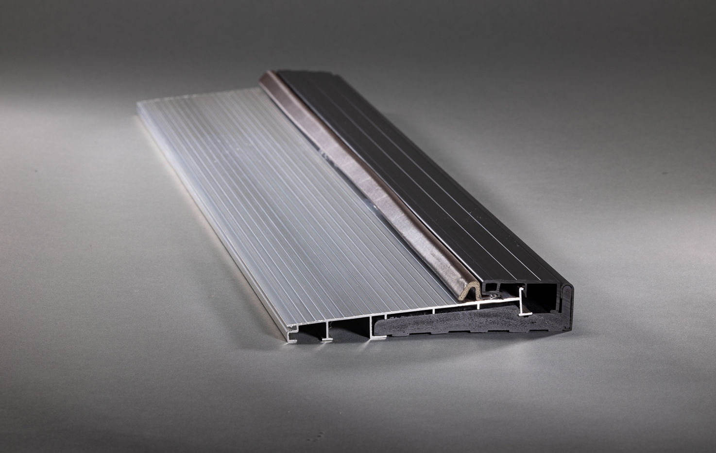 Angled view of a Flex Series Sill, emphasizing its sleek design and ridged surface for improved door fitting