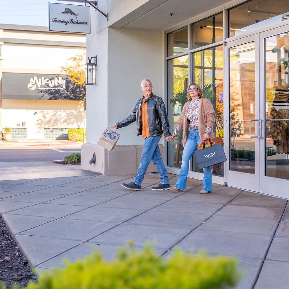 Couple walking around together at Fountains at Roseville