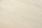 Detailed view of Falcata, a light, textured wood substrate, highlighting its durability and strength for heavy-duty use.