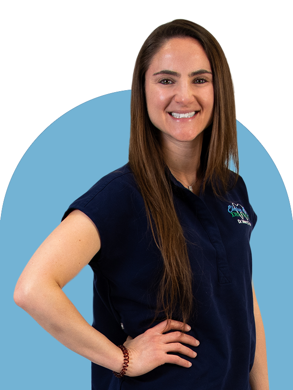  Dr. Mary Grace standing with hand on hip