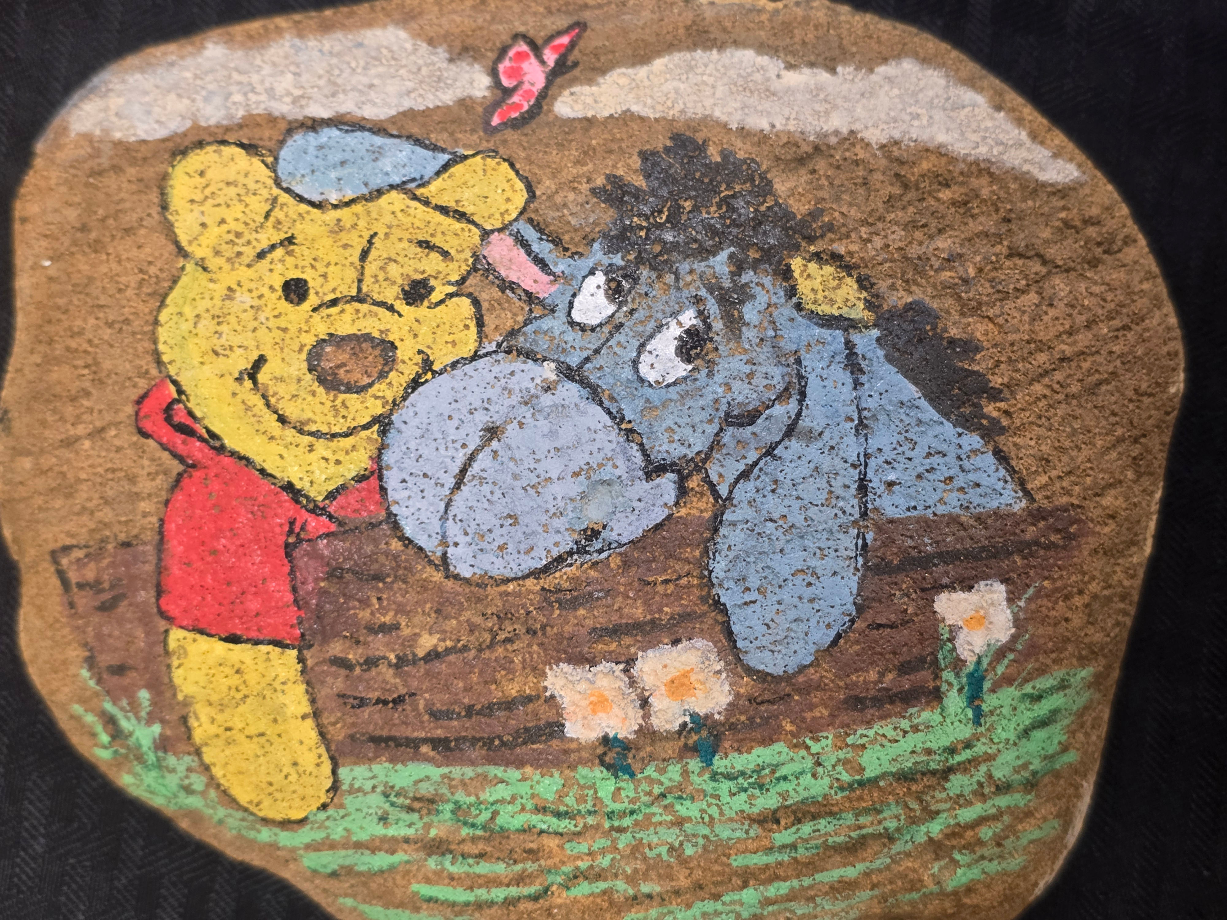 Winnie the pooh and eeyore rock
