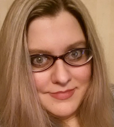 a photo of the tarot reader behind Rogue Heart Tarot