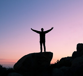 Canva - Silhouette of Man Raising His Hands.jpg