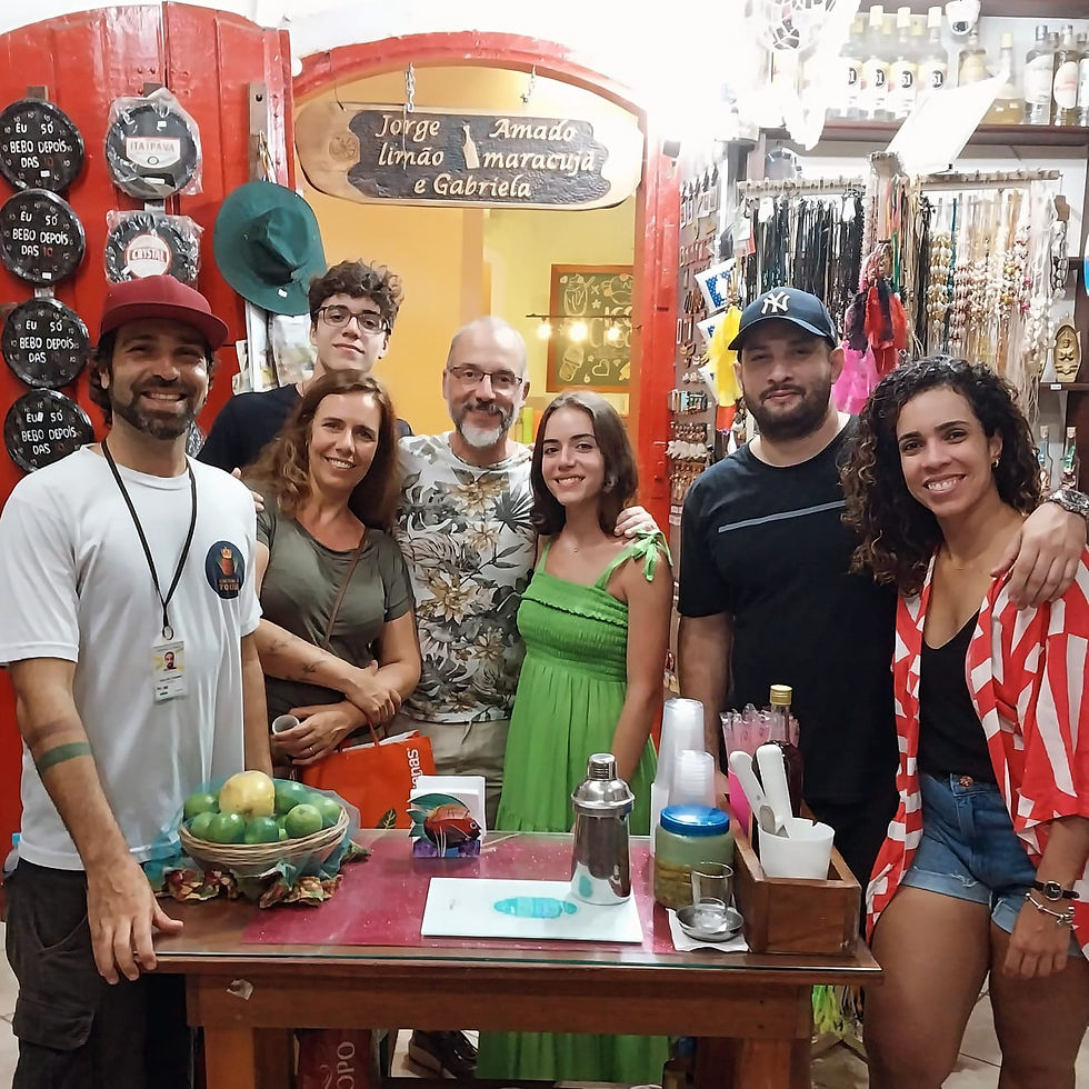 Tourists in Paraty exploring the history of cachaca on guided tour