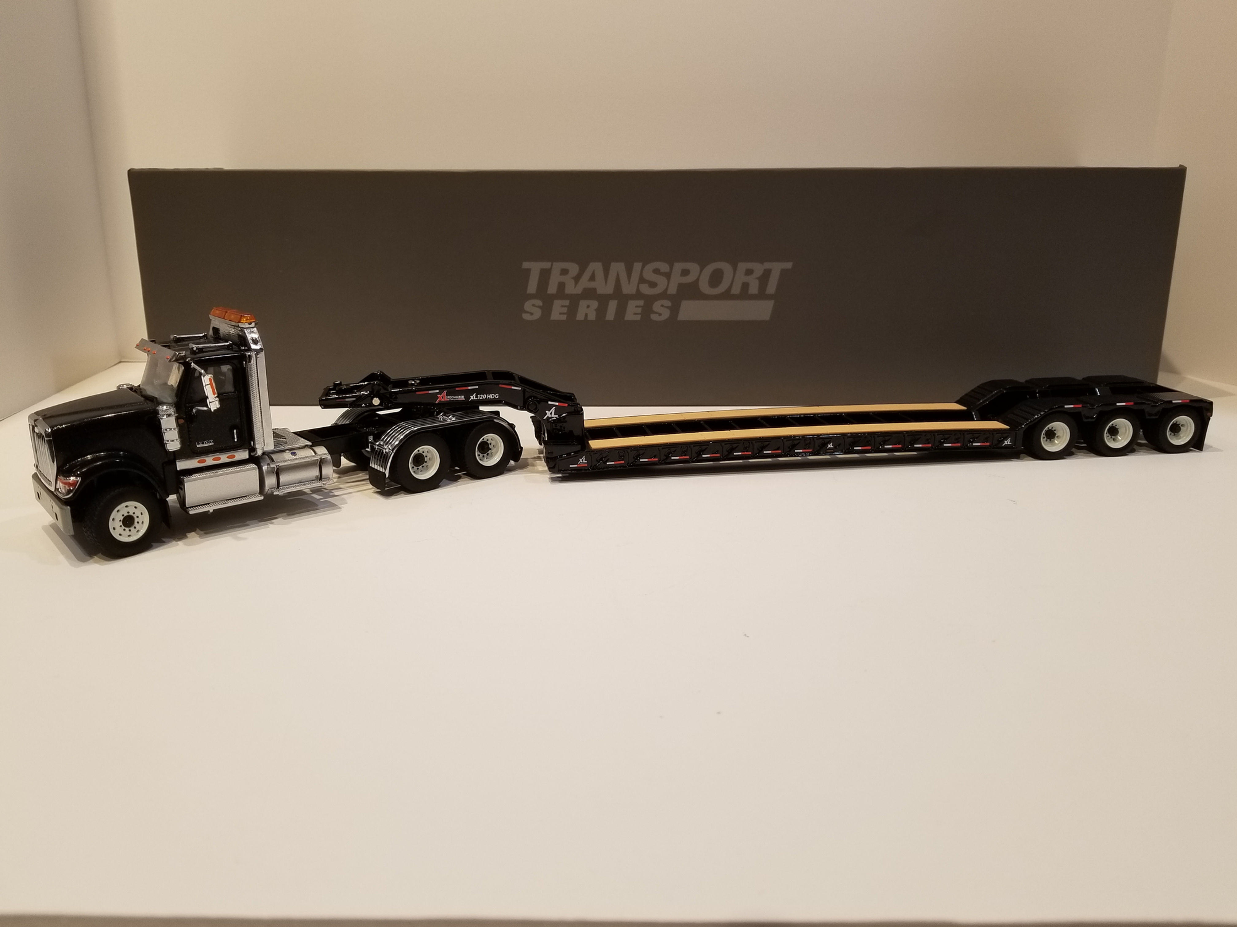 International HX520 Tandem Day Cab Tractor with XL 120 Lowboy Trailer in Black