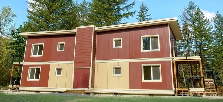multi unit house with red and tan siding