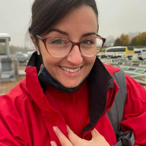Female in red on board a river ship