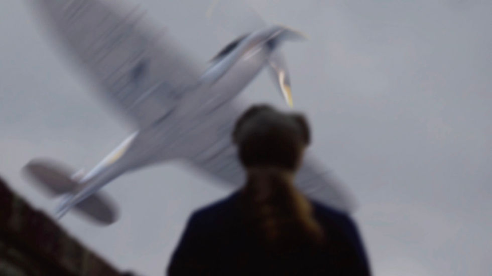 Plane flying over a woman in London 1940s, spitfire, airplane