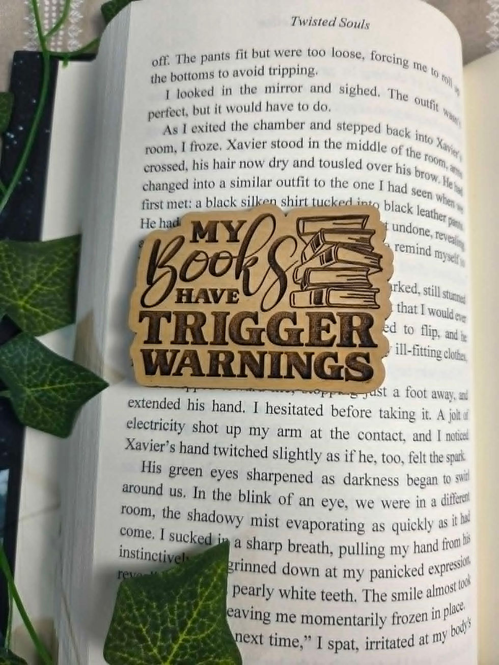 Wooden bookmark with text 'My Books Have Trigger Warnings'