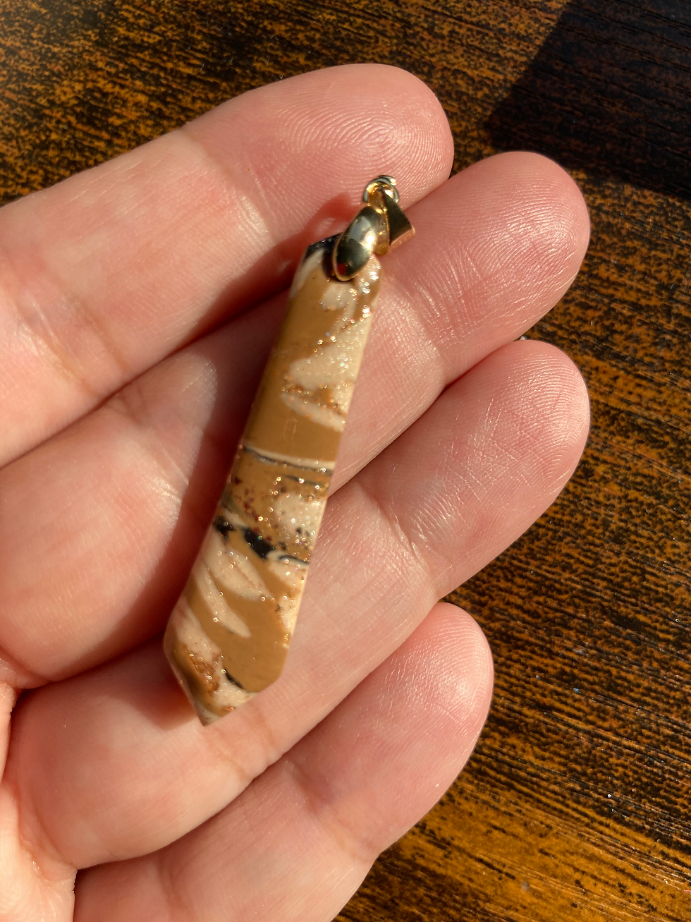 Thumbnail: Marbled light brown and black longline pendant on gold plated fittings