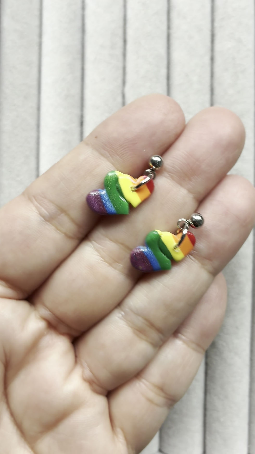 Thumbnail: Rainbow hearts earrings on stainless steel studs