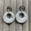 Thumbnail: Round silver and white earrings  on circle studs