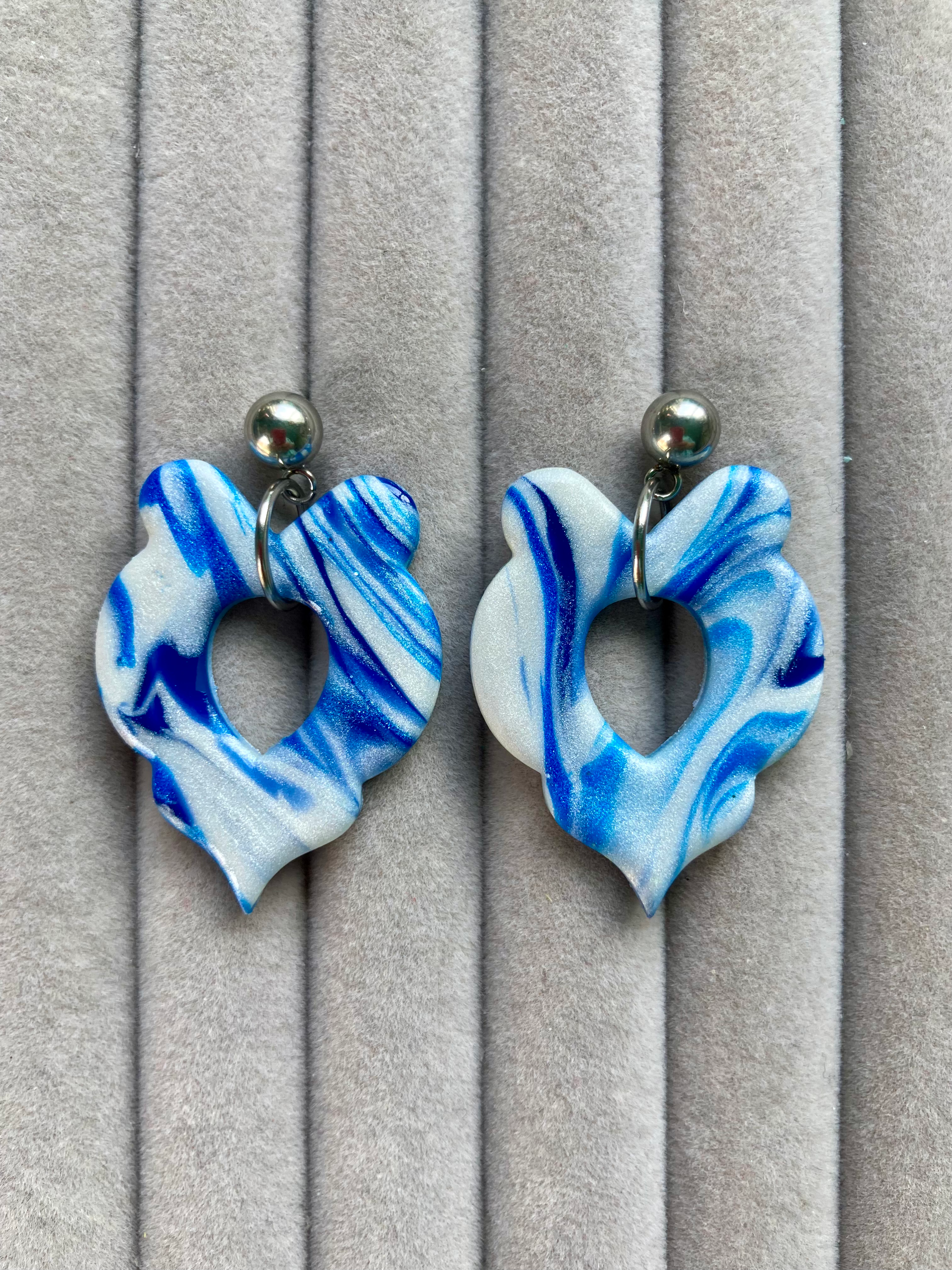 Large marbled blue and white dangle earrings on round studs