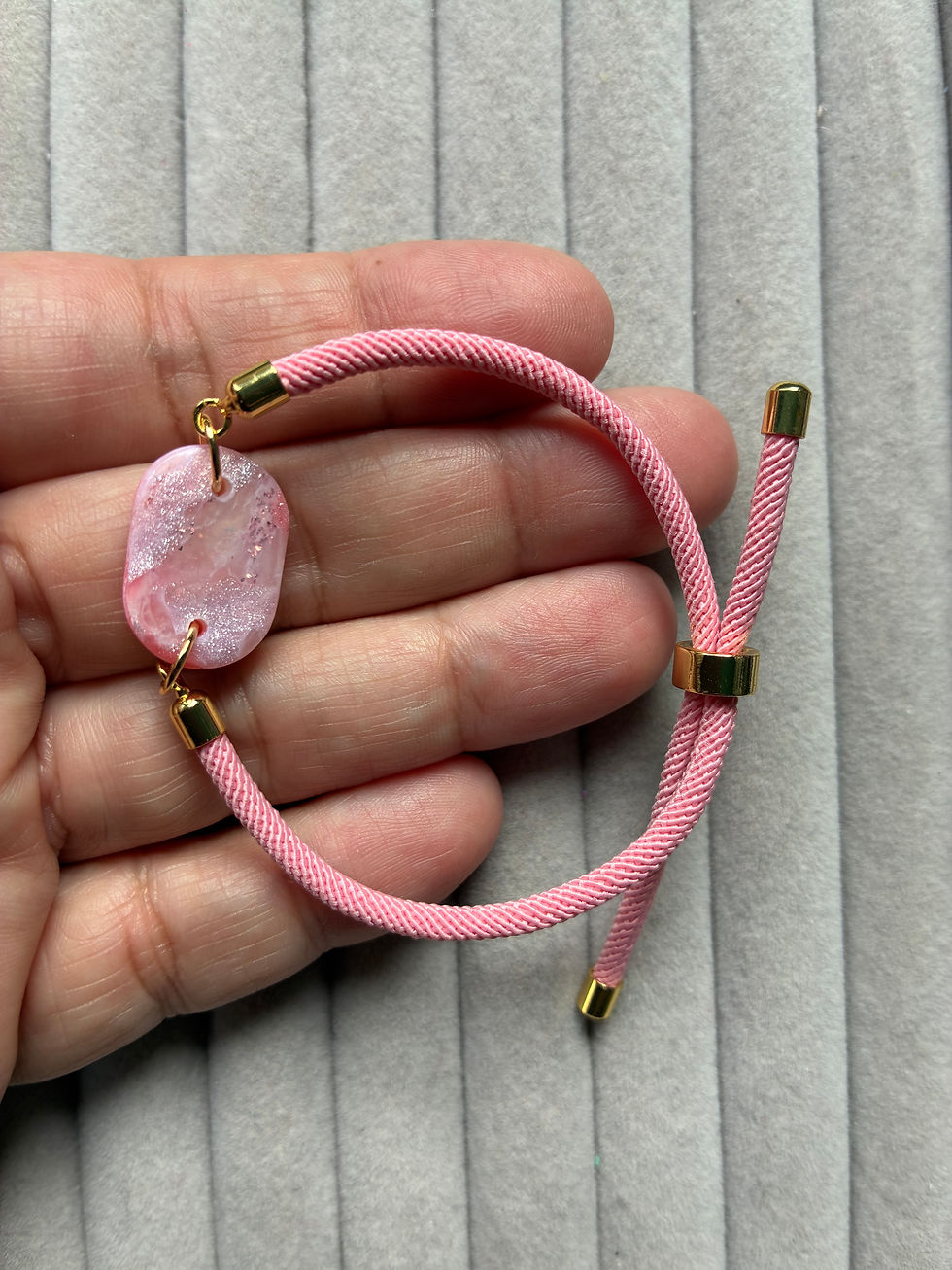 Thumbnail: Pink and white marbled polymer clay earrings and cord bracelet set