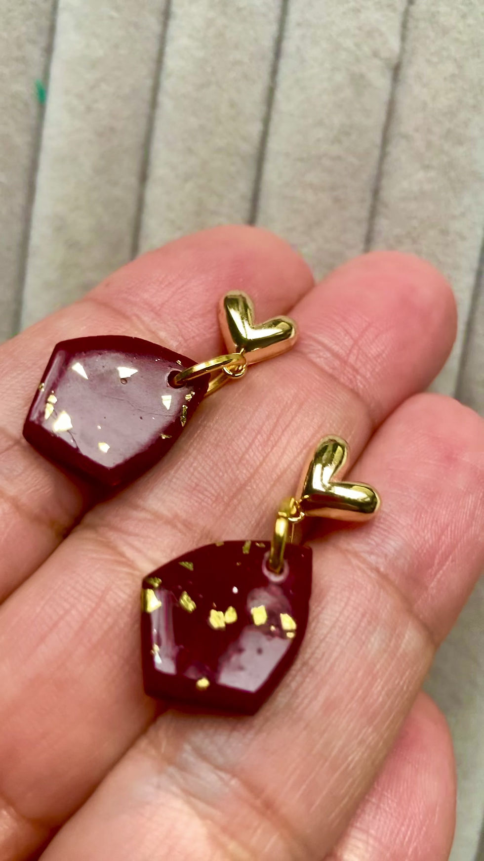 Thumbnail: Small shield drop earrings on heart shaped studs