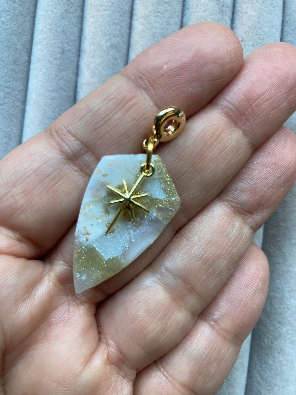 Thumbnail: Sparkly gold and white pendant with star charm on gold plated chain