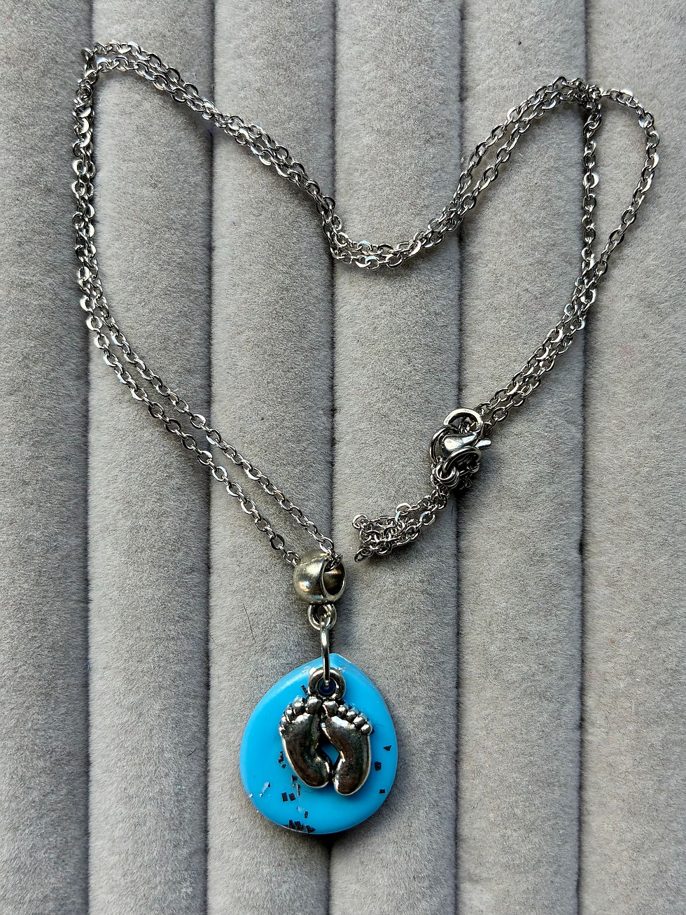 Thumbnail: ‘To the moon and back’ blue little toes necklace on stainless steel fittings 