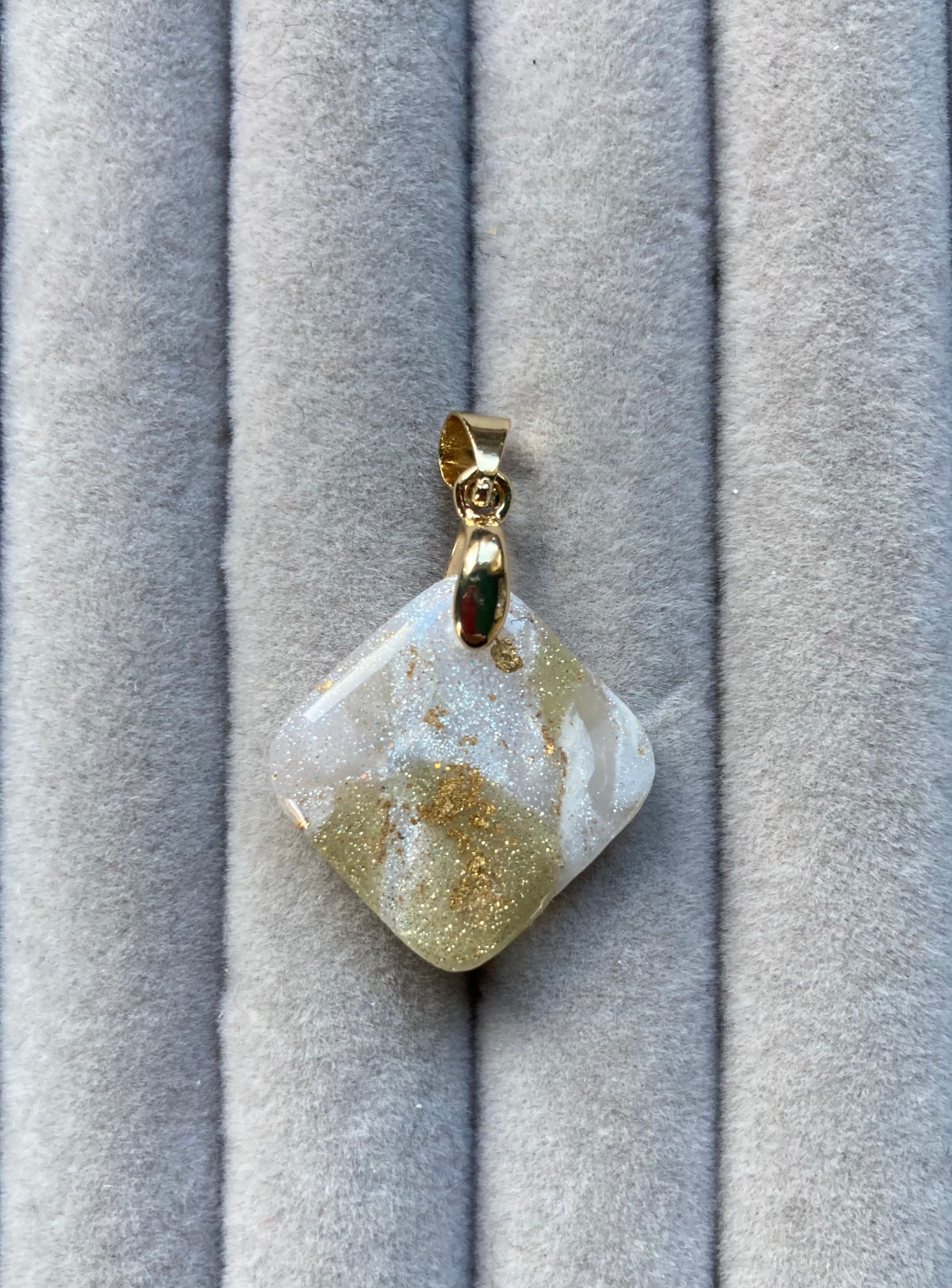 Sparkly gold and white rhombus pendant on gold plated fittings