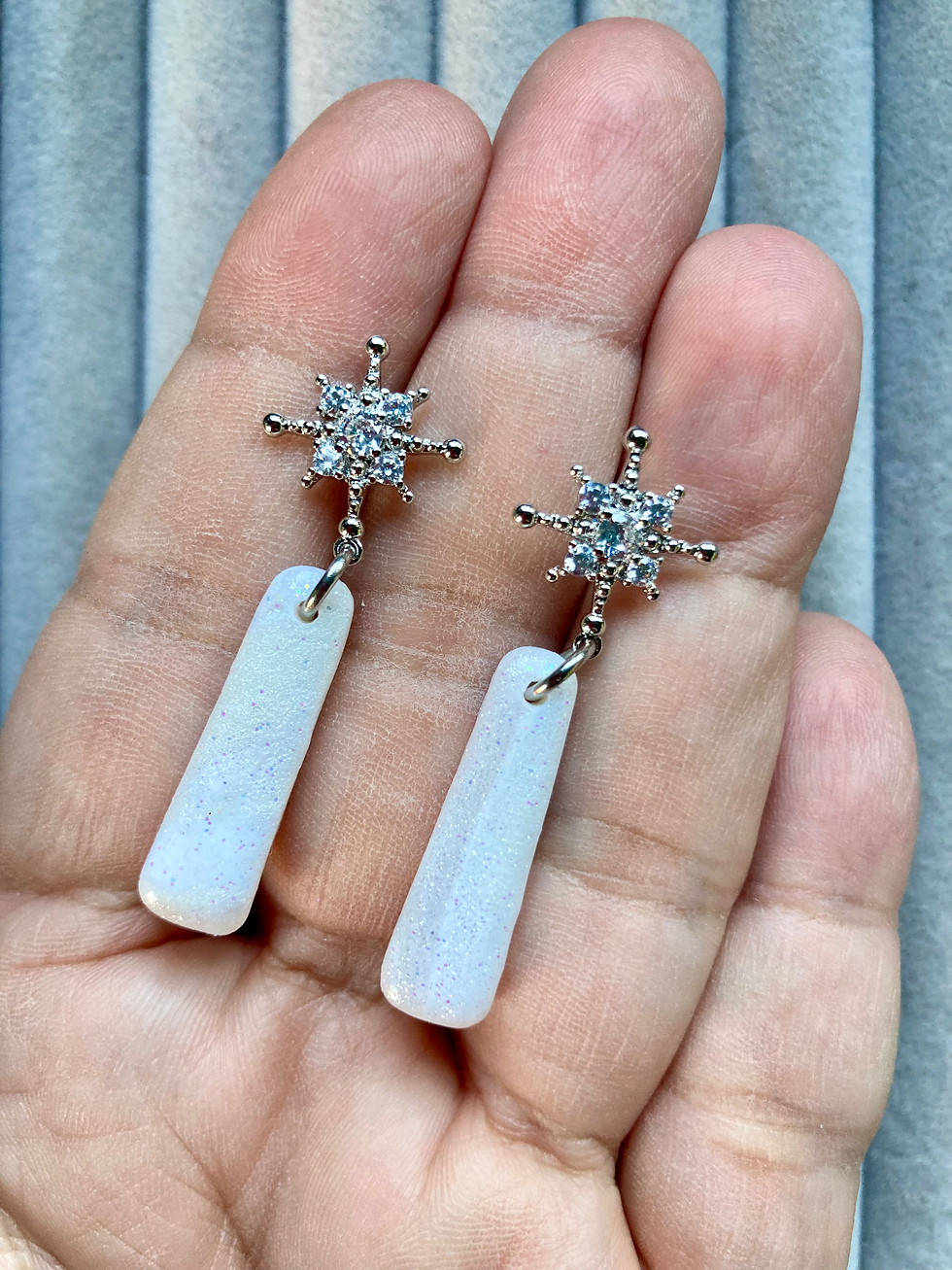 Thumbnail: Shimmery white earrings with stainless steel crystal starburst studs