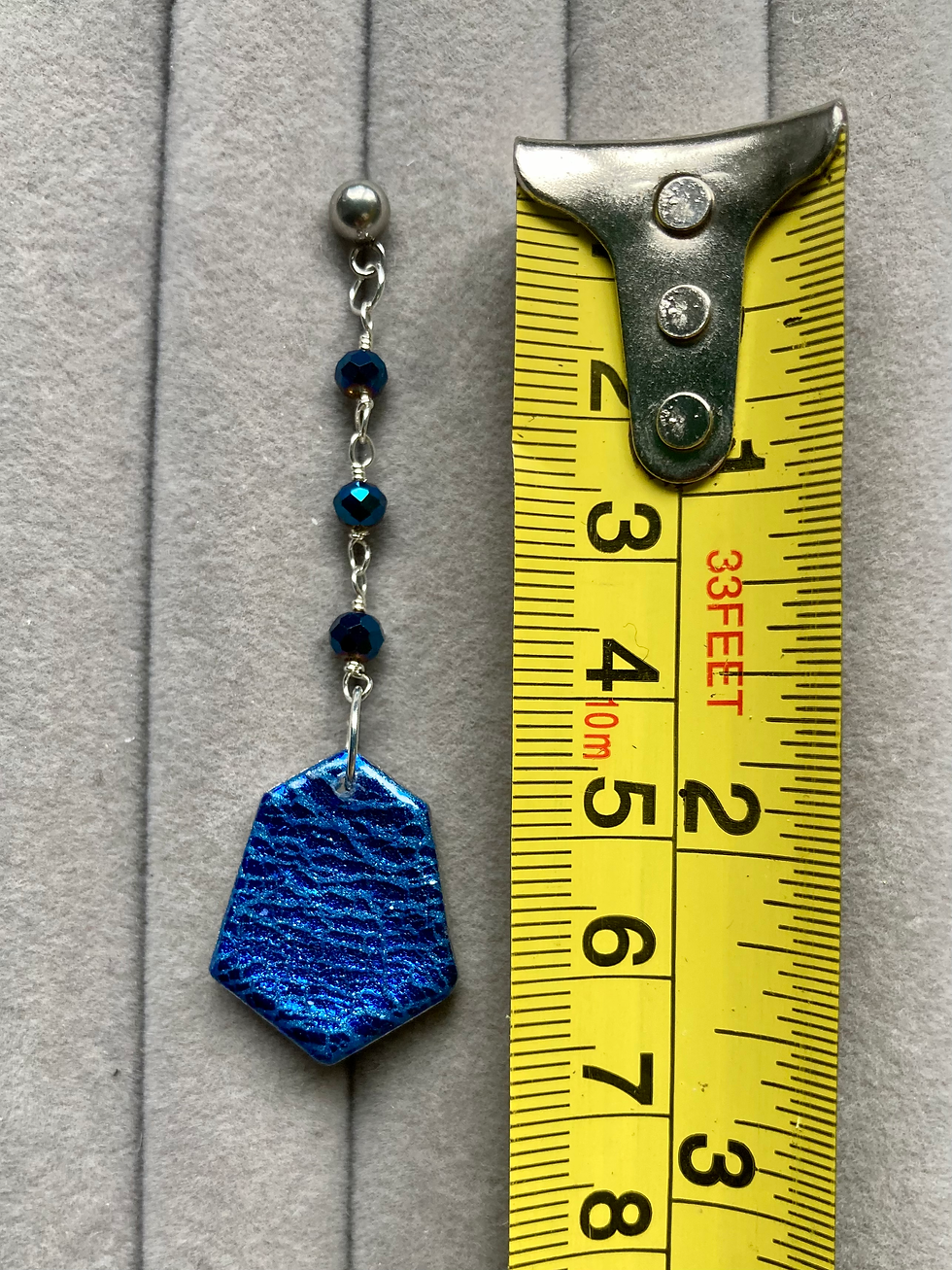 Thumbnail: Medium shield dangle earrings with blue crackle effect and beads