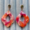 Thumbnail: Marbled orange and pink large dangle earrings on cubic zirconia star stu