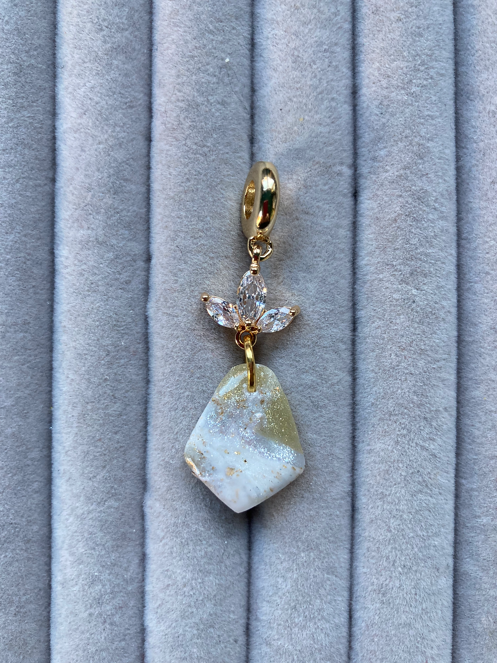 Thumbnail: Sparkly gold and white pendant with flower crystals on gold plated chain