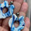 Thumbnail: Large marbled blue and white dangle earrings on round  studs