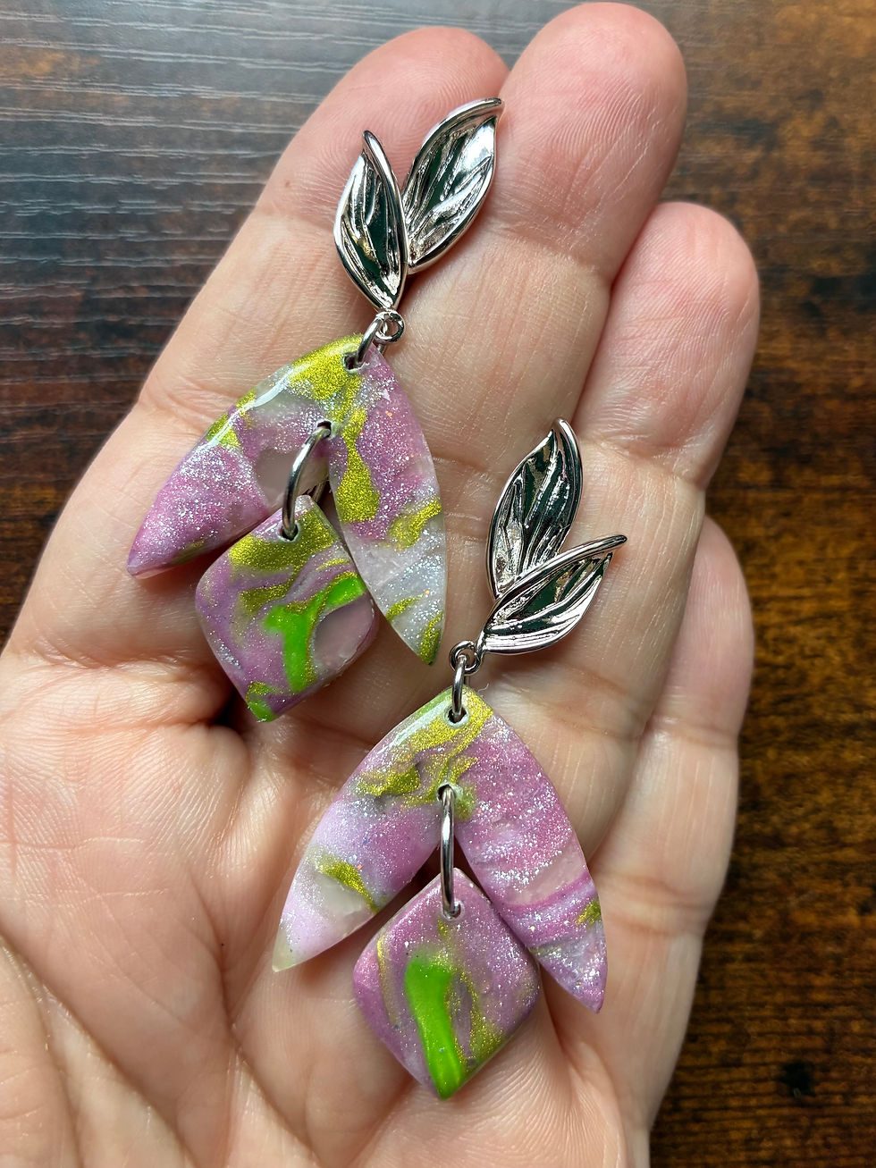 Thumbnail: Marbled pink and green dangle earrings on leaves studs