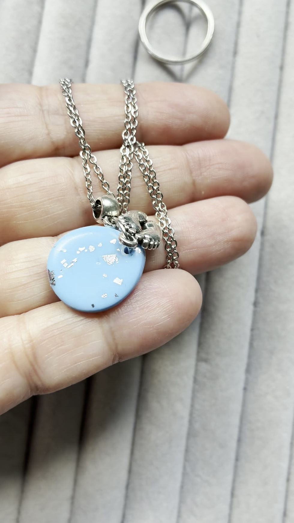 Thumbnail: ‘To the moon and back’ blue little toes necklace on stainless steel fittings 
