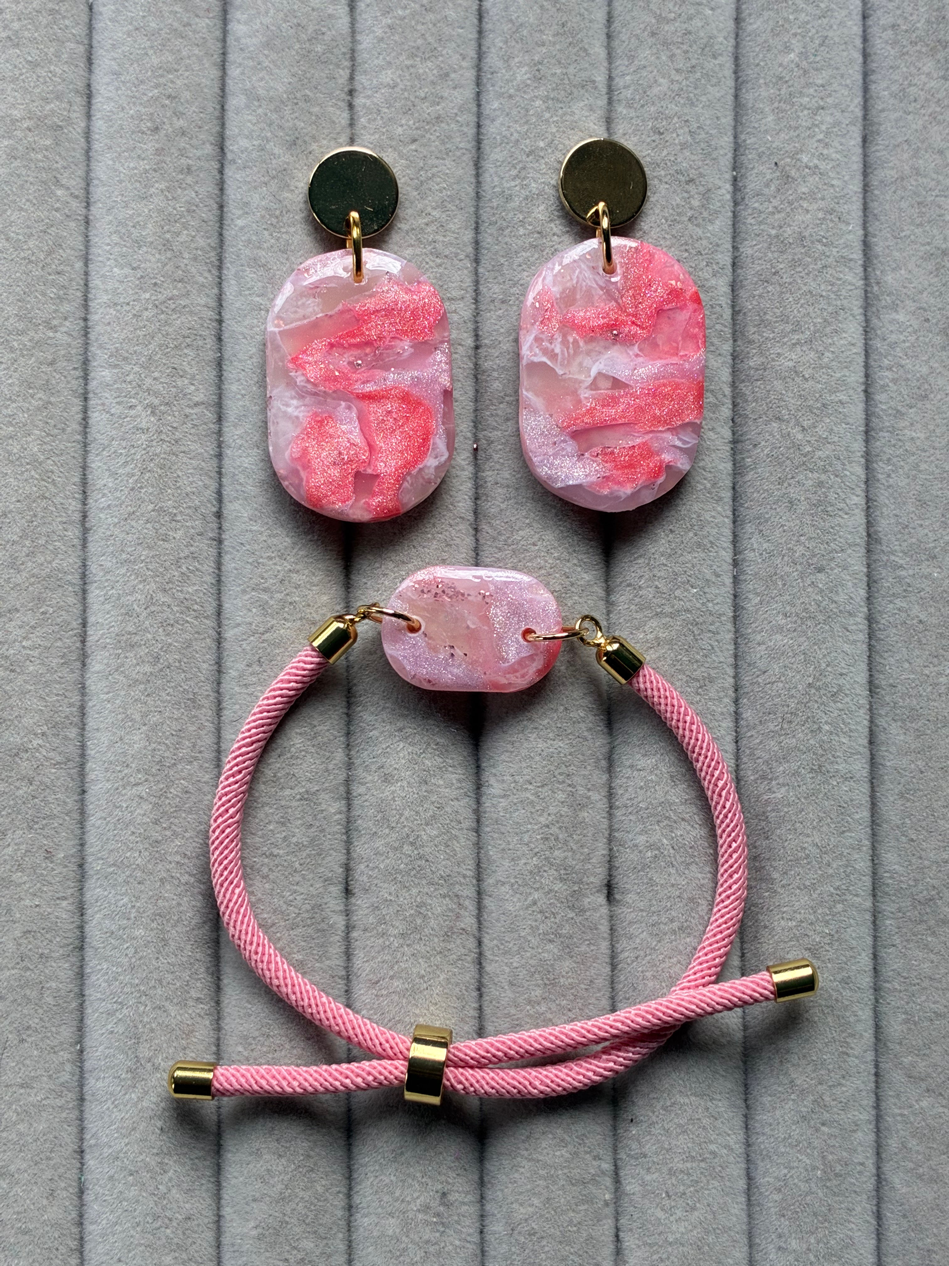 Pink and white marbled polymer clay earrings and cord bracelet set