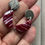 Thumbnail: Marbled burgundy half moons on round brushed studs