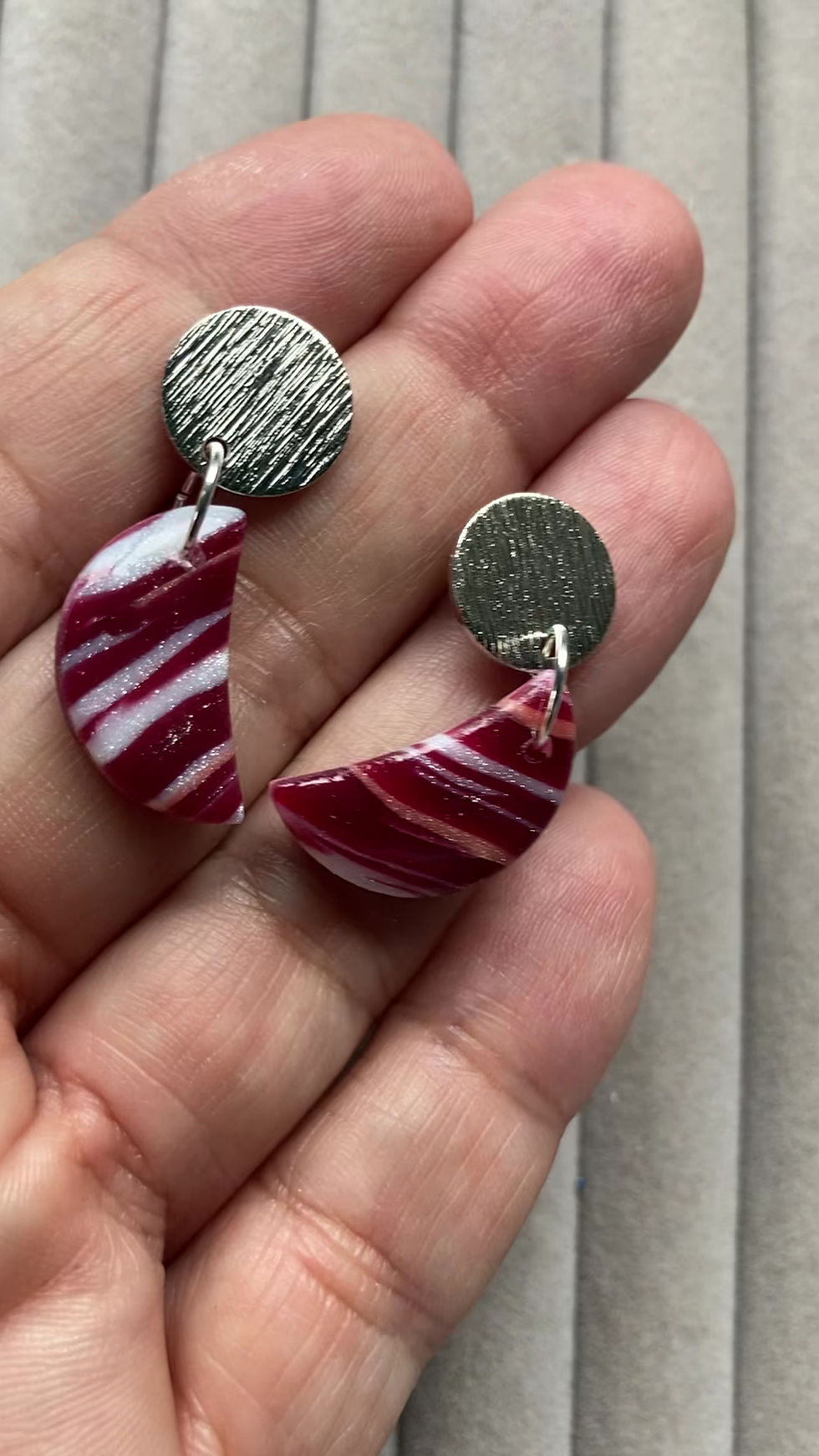 Thumbnail: Marbled burgundy half moons on round brushed studs