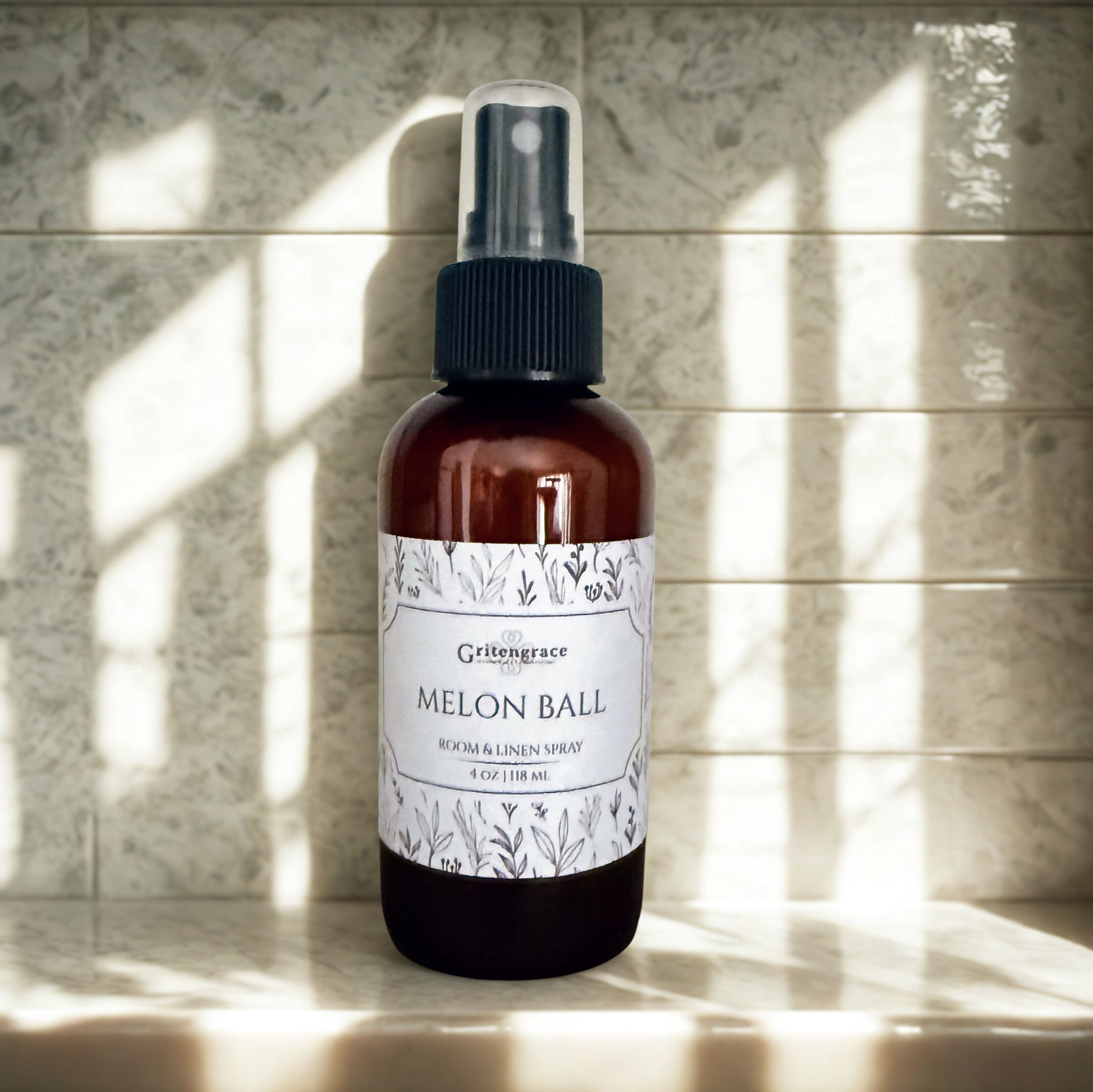 melon ball room and linen spray on a white counter