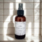 desert bloom room and linen spray on a white counter