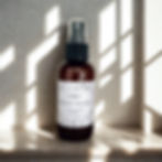 nordic woods room and linen spray on a white counter