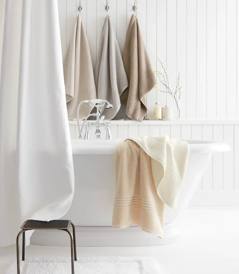 Luxury furniture online towels on white bathtub