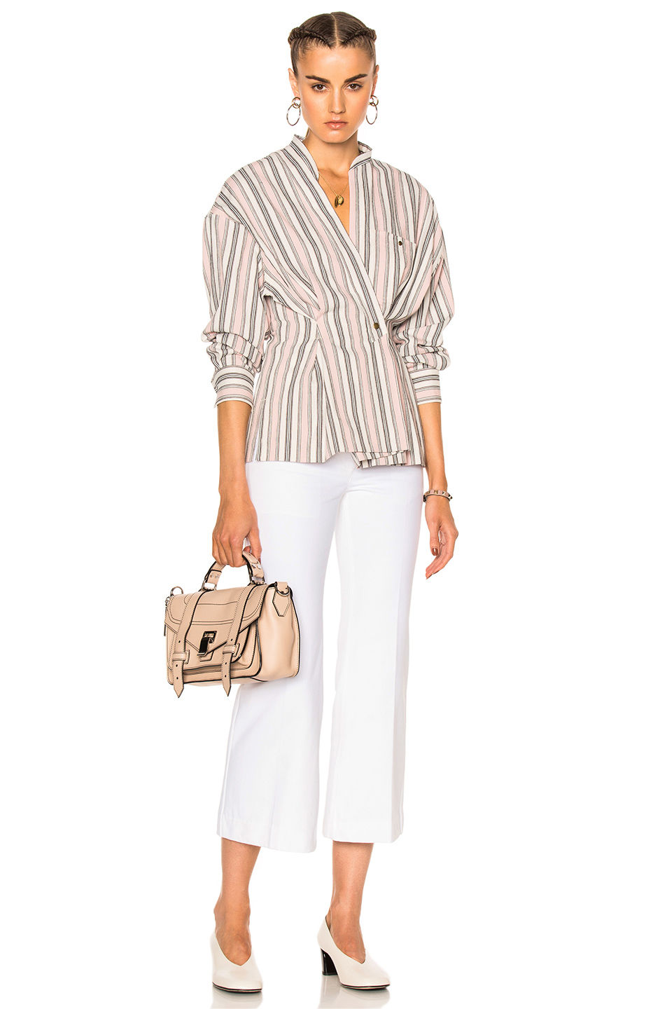 Calvin Klein Collection Fray Bis Five Pocket Jeans $595 paired with Isabel Marant Silvia Wrap Top