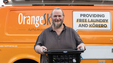 Video still of a man with a washing basket in Hastings