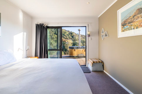 interior photo of a bedroom with a view