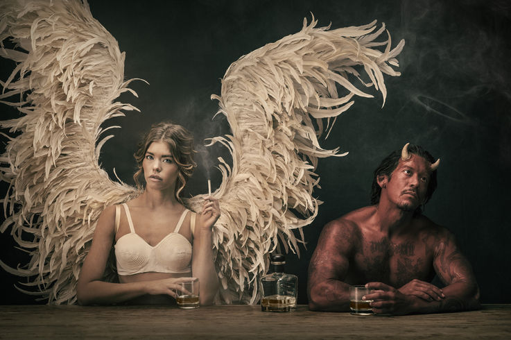 Creative photography. Angel and devil.