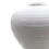 Thumbnail: Close-up of large round white ceramic vase showing smooth matte stone finish and sculptural handcrafted shape.