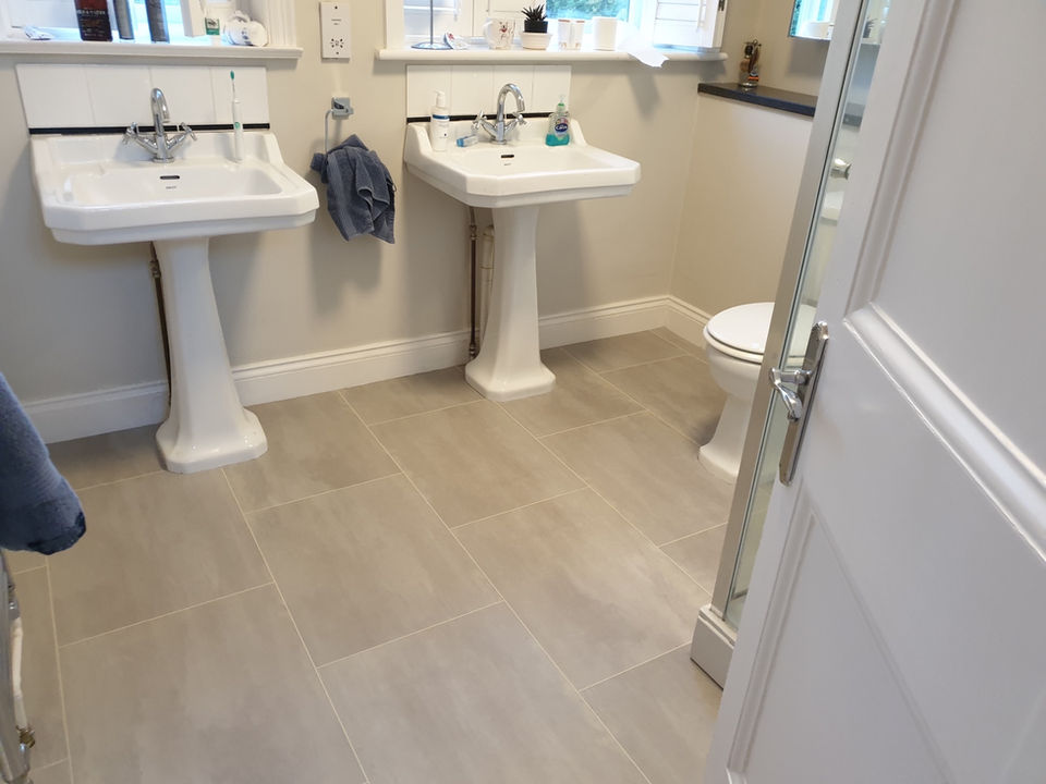 Karndean flooring in a bathroom placed by Surrey Carpet & Flooring