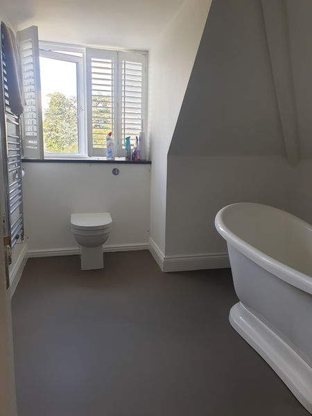 Latex flooring in a bathroom installed