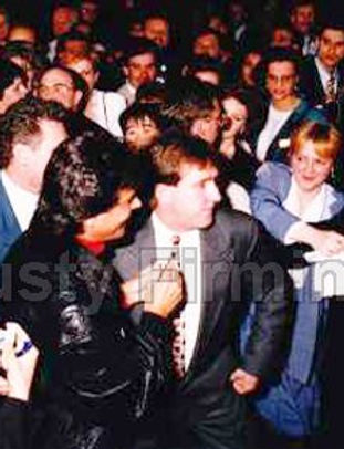 Rusty Firmin in a crowd full of people.