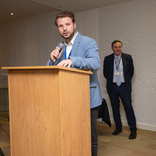 Daniel Nikolla speaking at a University of West London Alumni networking event.