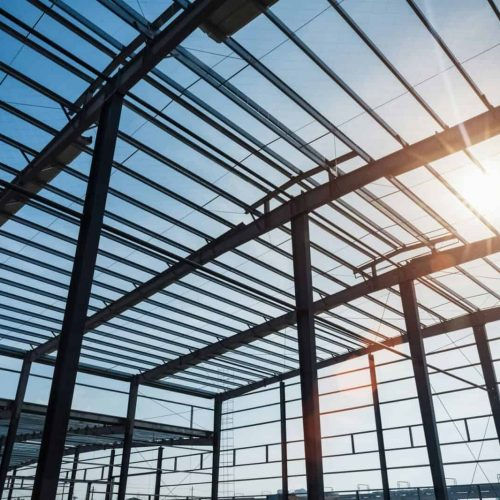 steel-structure-workshop-in-construction-steel-frame-factory-building-closeup-e17187036182