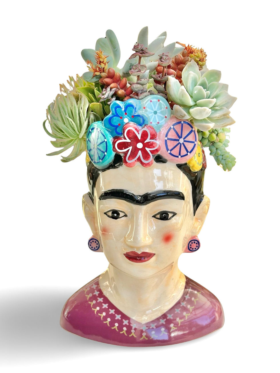 Thumbnail: A fabulous Frida Kahlo planter brimming with a variety of colourful succulents